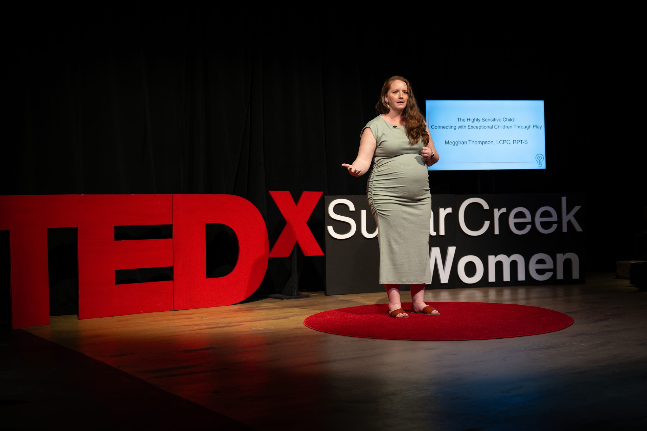 megghan on TEDX stage